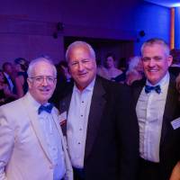 Guests posing together in the Laker Lounge